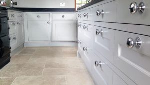 hand painted kitchen units and drawers with chrome handles